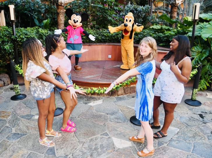 Guest Photo from Diane Elias: Guests with Mickey Mouse and Pluto at Aulani resort